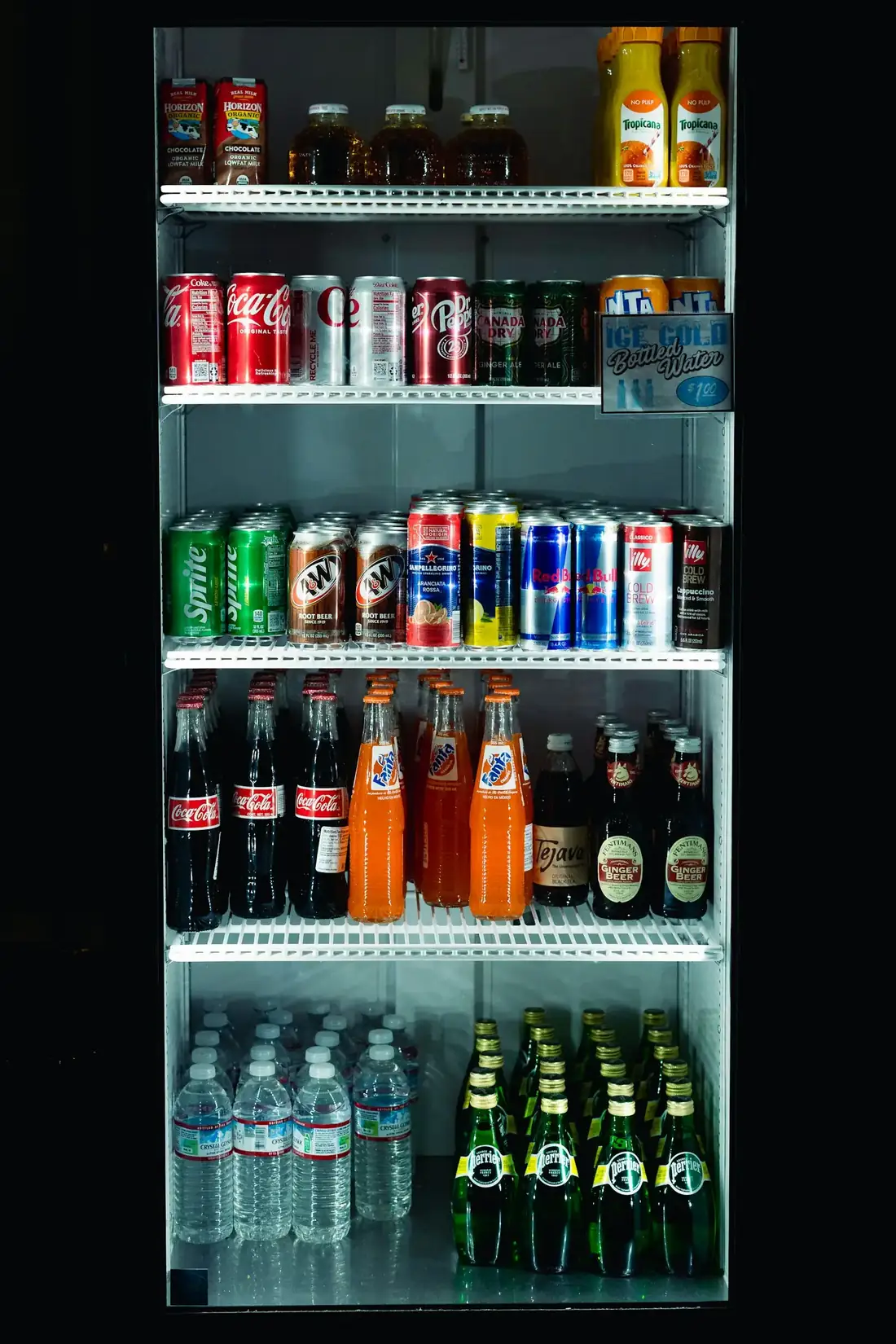 Cooler stocked with assorted beverages